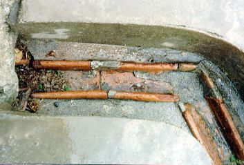 Terracotta drain running under pavement,Knossos, Crete